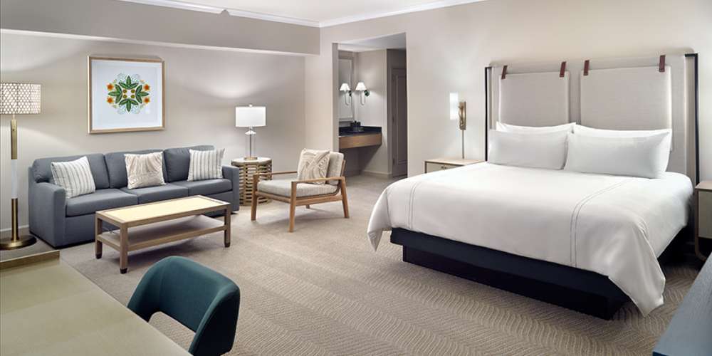 Omni Orlando Resort at ChampionsGate hotel guest rooms and suite bedroom custom furniture and casegoods
