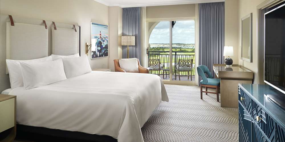 Omni Orlando Resort at ChampionsGate hotel guest rooms and suite bedroom custom furniture and casegoods
