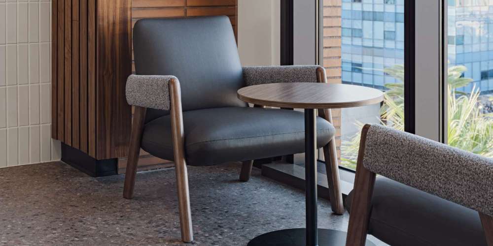 Lounge chair and table near a window