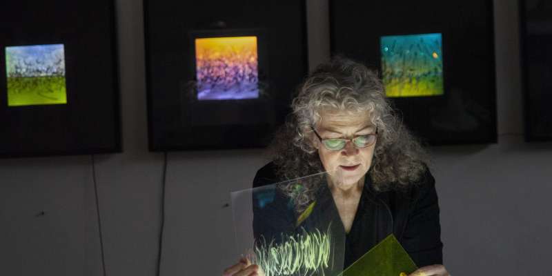 Lyn Godley in studio creating art