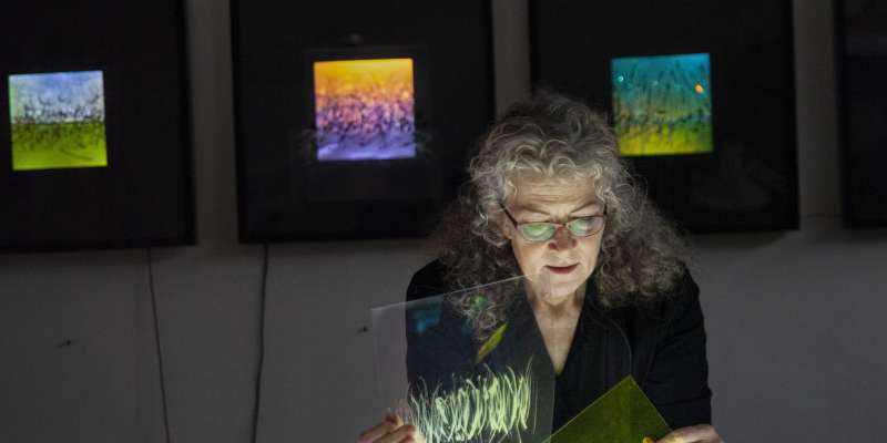 Lyn Godley in studio creating art