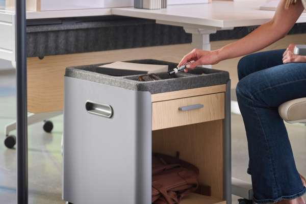 Mobile storage unit within Kaleid workstation system, featuring integrated drawer, shelving, and soft-lined top