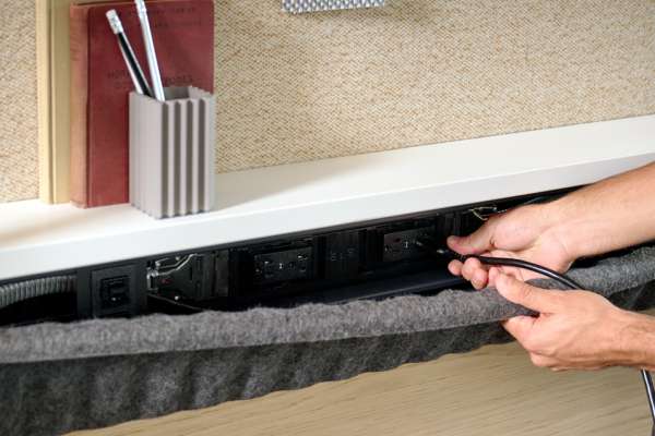 Integrated power distribution and wire management system within Kaleid workstation by OFS