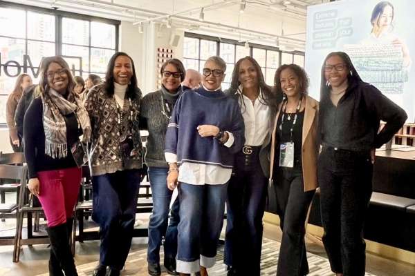 Group of design professionals posing together at IIDA Industry Roundtable