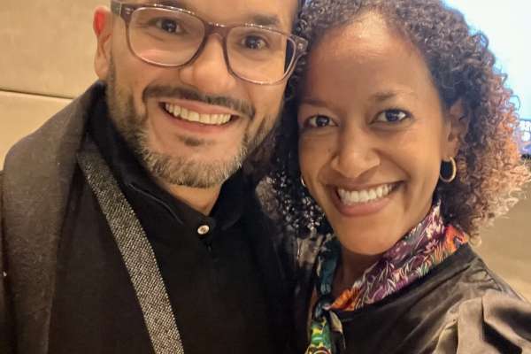 Maria VanDeman and Gilbert Broco taking a photo together at IIDA Industry Roundtable event