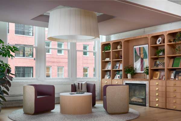 Carolina Elara and X&O table with OFS custom library in Chicago showroom