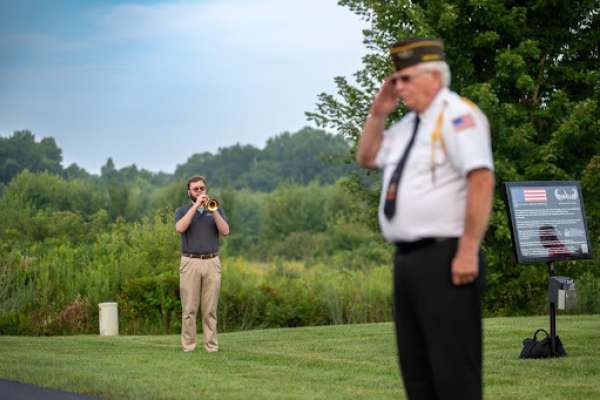 veteran-saluting-man-playing-trumpet-at-honor-and-remember-run