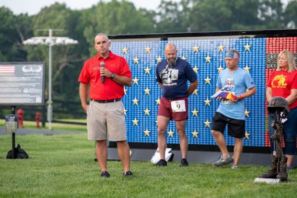 man-speaking-at-honor-and-remember-run