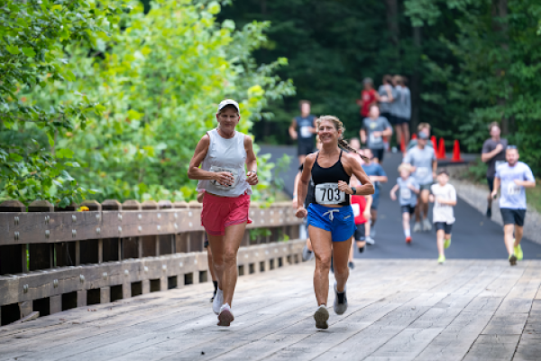 two-women-jogging-at-honor-and-remember-run