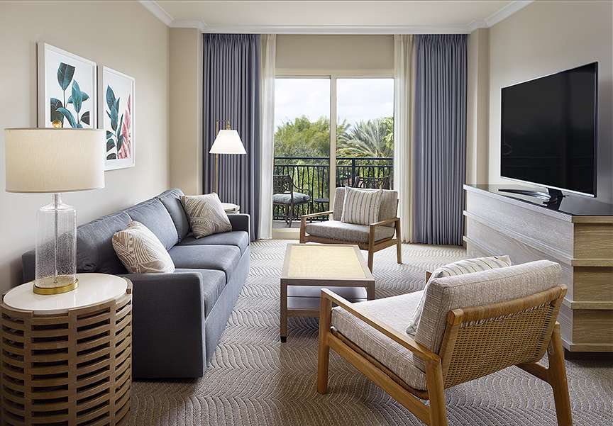 Omni Orlando Resort at ChampionsGate hotel guest rooms and suite bedroom custom furniture and casegoods