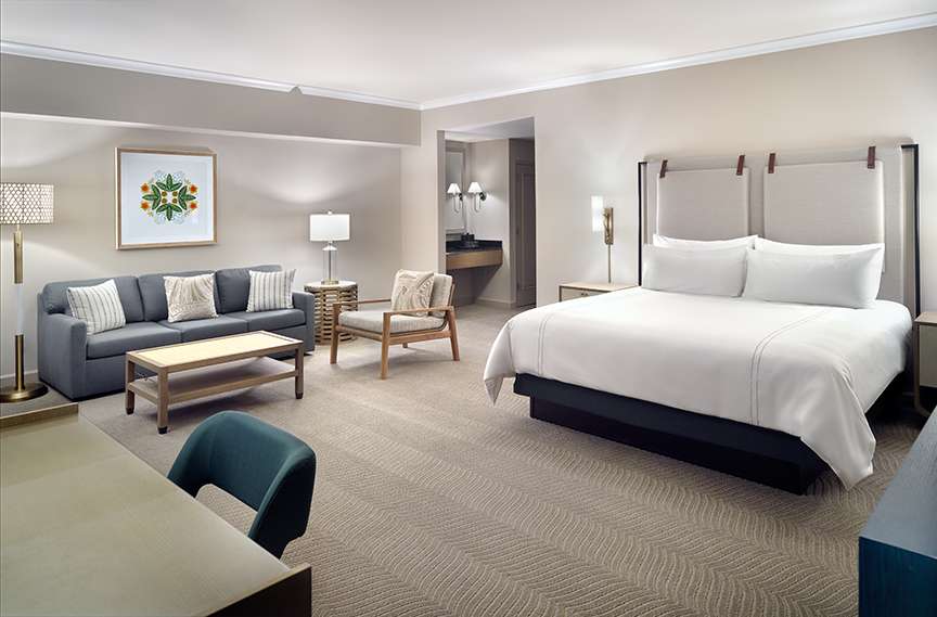 Omni Orlando Resort at ChampionsGate hotel guest rooms and suite bedroom custom furniture and casegoods