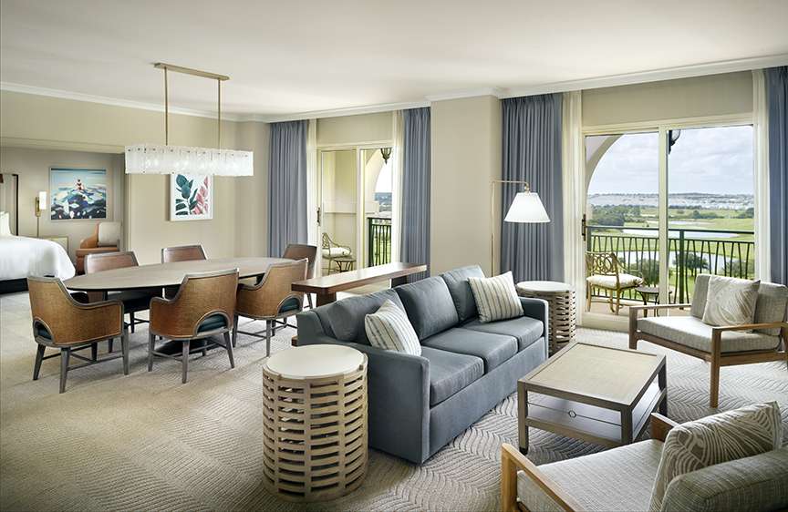 Omni Orlando Resort at ChampionsGate hotel guest rooms and suite bedroom custom furniture and casegoods