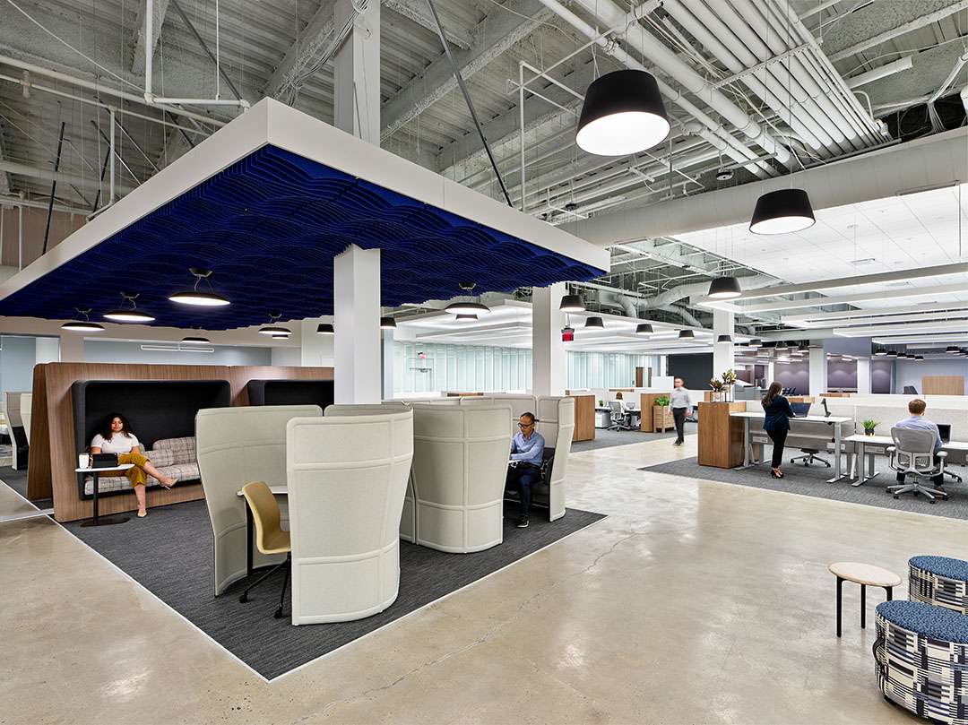 Individual work pods and seating within an office