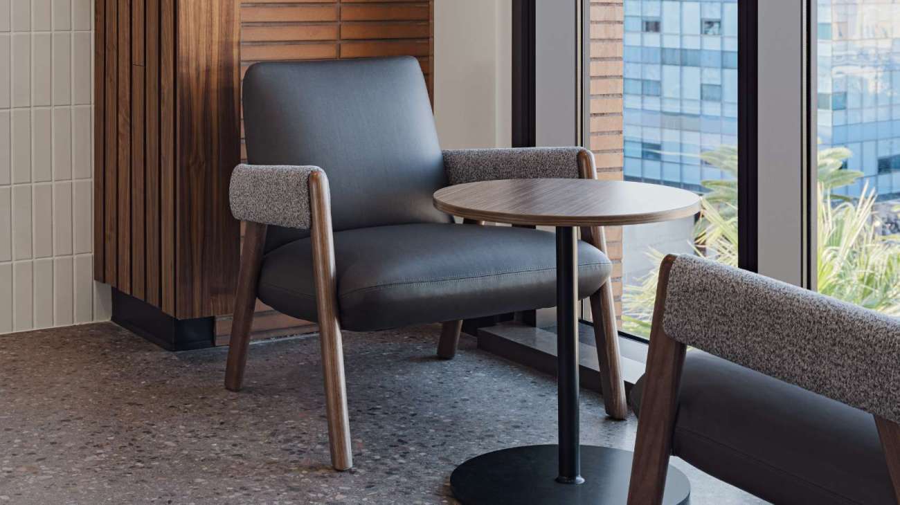 Lounge chair and table near a window