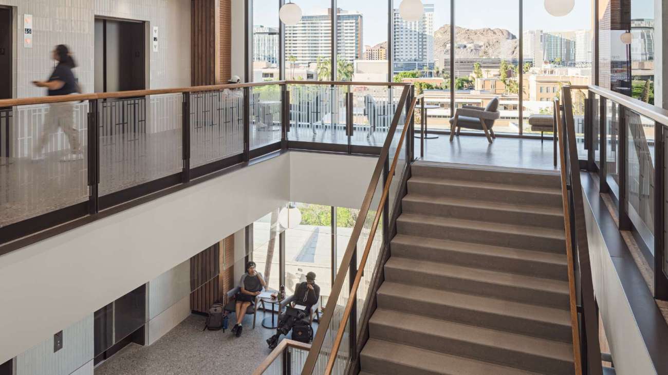 Stairs coming up from one study area to another in a university setting