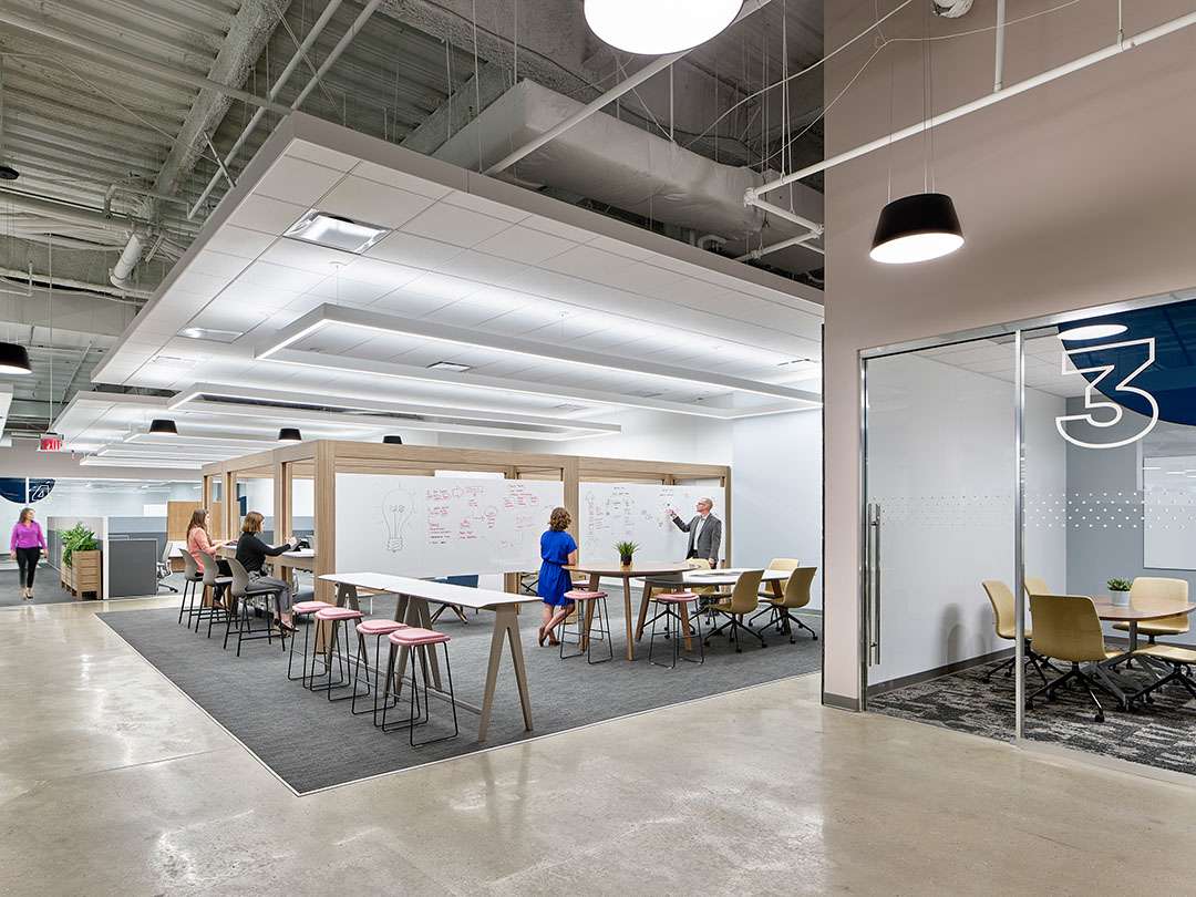 Large architectural structure within an office to create meeting rooms