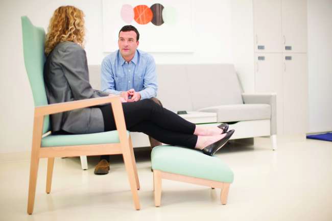 Rein+ and Wood Patient Ottoman