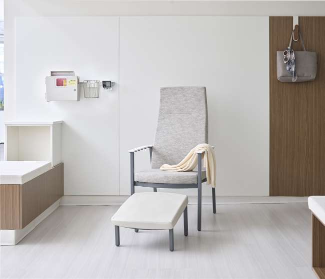 Serony and Metal patient ottoman